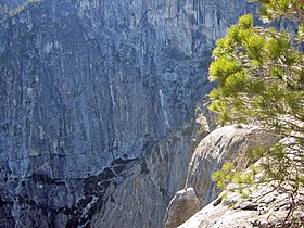 Note climber on top of spire