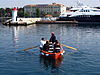 A rowing boat ferry at the entrance of the harbour