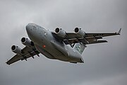 A Boeing C-17 Globemaster III, tail number 95-0103, taking off from RAF Mildenhall in the United Kingdom. It is assigned to the 62nd Airlift Wing and the 446th Airlift Wing at Joint Base Lewis McChord in Washington, USA.