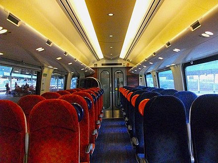 Standard-class interior of Class 221 Super Voyager operated by CrossCountry. On this train, seat reservations appear on the display above each pair of seats. Others may use paper tags inserted into each headrest.