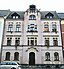 Tenement house from 1905 with original front door and dormer windows. In Falkenstein/Vogtl. Germany, Gartenstraße 68.