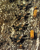 A-7D Corsairs in a disruptive pattern, countershaded with white, on a disruptively painted surface, Thailand, 1972. A-7D Corsairs 354th TFW at Korat 1972.JPG