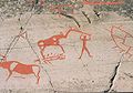 Figur fra helleristningene i Alta som har blitt tolket som elgjakt eller en sjaman som snakker med dyret.