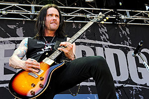 Kennedy performing with Alter Bridge in 2012.