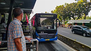 Awaiting Transjakarta Bus Corridor 2 in Monumen Nasional BRT Station.jpg