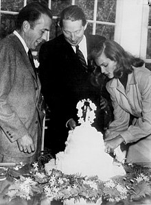 Best man Louis Bromfield (center) at the wedding of Humphrey Bogart and Lauren Bacall at Malabar Farm (May 21, 1945) Bogart Bacall wedding 1945.jpg