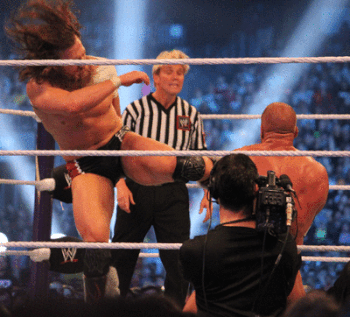 Daniel Bryan delivers Yes! Kicks (shoot kicks) to Triple H's chest at WrestleMania XXX.