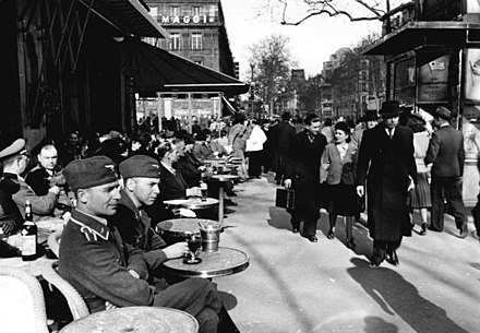 Stuart Immonen frequently referred to photographs of 1940s France while illustrating Moving Pictures. Bundesarchiv Bild 101I-247-0775-38, Paris, Strassenszene.jpg