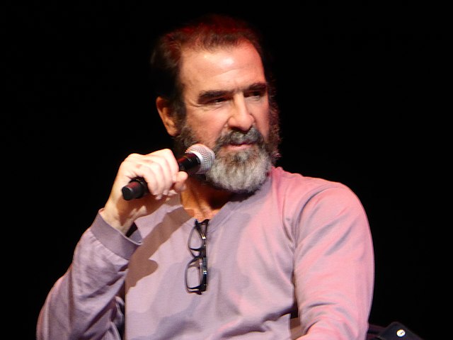 Cantona being interviewed on stage