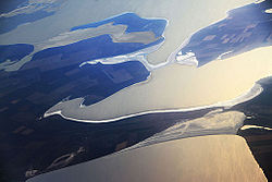 Northern part of Chonhar peninsula with two parts of the mainland on the right. View from altitude 12,000 m.