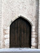 Le portail du clocher-porche et son arc de décharge