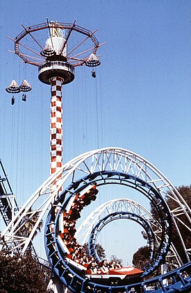 Corkscrew, at Knott's Berry Farm, circa 1980, before being relocated to Silverwood. Corkscrew and Sky Jump, Knott's Berry Farm, circa 1980.jpg