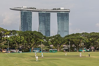 Cricket match and Marina Bay Sands Hotel in Singapore.jpg