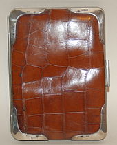 A cigar case made of crocodile skin with sterling silver appointments bearing a Birmingham hallmark for 1904 Croccigarcase.jpg