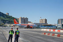 An EasyJet aircraft taxiing on Gibraltar Airport's runway EasyJet aircraft crossing Winston Churchill Avenue in Gibraltar.jpg