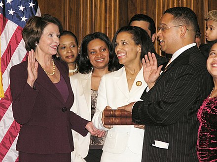 Pelosi and Rep. Keith Ellison at his swearing-in ceremony with Thomas Jefferson's Quran in 2007