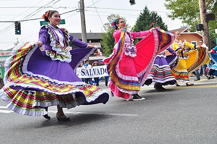 The dance group Joyas Mestizas ("Mestiza jewels") performs at the Fiestas Patrias Parade, South Park, Seattle, 2017