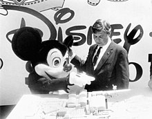 Florida Governor Bob Graham and Mickey Mouse looking at a model of Disney studios.jpg