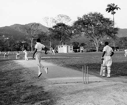 Cricket game in Trinidad, 1960 Game of cricket in Trinidad (8726230978).jpg