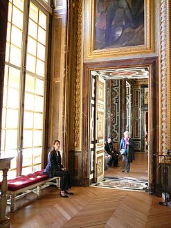 Salle du Sacre with a view toward Salle des Gardes in the Queen's Grand Apartment