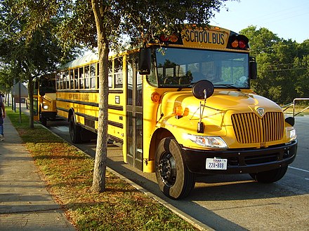 A Houston ISD CE300 school bus made by IC Corporation.