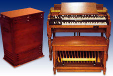 A Hammond B3 organ, beside a Leslie speaker cabinet. Both the Hammond organ and sound treatment via a Leslie speaker feature significantly on the Beatles' recording. Hammond b3 con leslie 122.jpg