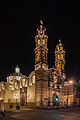 * Nomination St Christobal Church, Puebla, Mexico --Poco a poco 11:31, 6 September 2014 (UTC) * Promotion Very good night shot with a black sky that deserves the term "black". The only thing that I would enhance (not required for QI) is the shine of a red traffic light at the left border. --Cccefalon 15:20, 6 September 2014 (UTC)  Done, thanks, Poco a poco 20:35, 6 September 2014 (UTC)