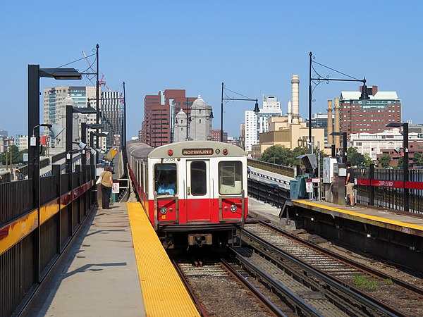 A southbound Red Line train entering Charles/MGH station from the Longfellow Bridge in 2019