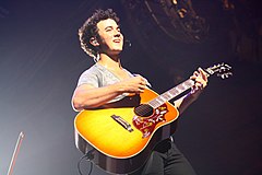 Jonas performing in 2009 Kevin Jonas 2009.jpg