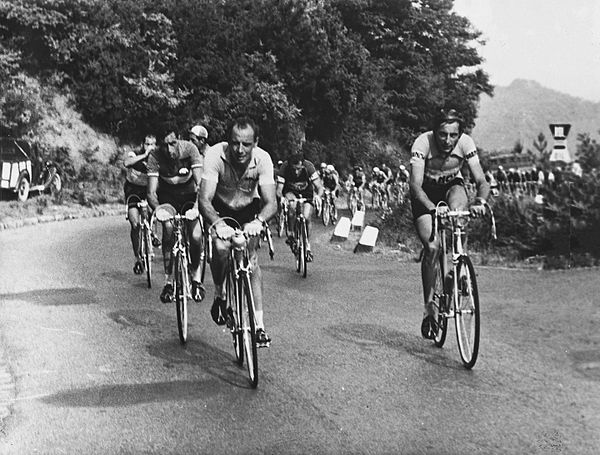 Coppi (right) riding the 1953 Giro d'Italia