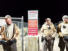 Lincoln County deputies guard the back gate of Area 51 during the 2019 raid. Lincoln County Deputies at Area 51 Back Gate.jpg