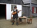 Un musicien à la forteresse de Louisbourg.