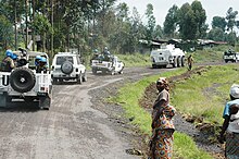 FIB vehicles outside Goma in October 2013 during the unit's counteroffensive against M23 rebels MONUSCO Force Intervention Brigade patrol on the main road connecting the towns of Sake and Kibati.jpg