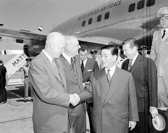 US President Dwight D. Eisenhower and Secretary of State John Foster Dulles greeting President Ngô Đình Diệm of South Vietnam in Washington DC, 8 May 