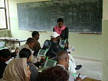 Teachers training with laptop at Menelik II School One Laptop Per Child - Menelik II teacher training (by).jpg