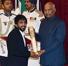 The President, Ram Nath Kovind presenting the Padma Shri Award to Punia at the Rashtrapati Bhavan in New Delhi, 2019.