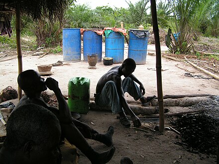 Local distillation of palm wine in Ghana