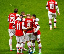 Arsenal players celebrating Lukas Podolski's goal against Coventry City Podolski scores, 2014 FA Cup 4th rd, Arsenal vs Coventry.jpg