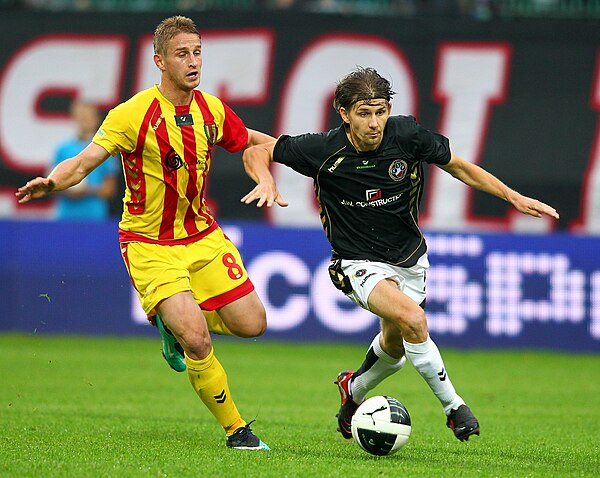 Away game with Polonia Warsaw played in the 2010–11 Ekstraklasa