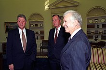 President Bill Clinton meeting with former presidents George H. W. Bush and Jimmy Carter at the White House in September 1993 President Bill Clinton meeting with former Presidents George H.W. Bush and Jimmy Carter at the White House.jpg