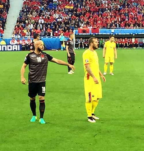 Alibec (in yellow, in the foreground) playing against Albania at the UEFA Euro 2016.