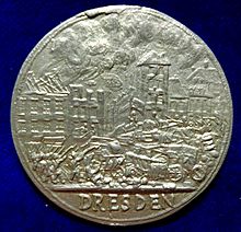 Revolutionary war medal of the May Uprising in Dresden, Kingdom of Saxony, 1849, obverse, showing the street fighting. Revolutionary War Medal of the May Uprising in Dresden, Kingdom of Saxony, 1849, obverse.jpg