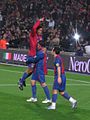 Ronaldinho celebrates a goal with Belletti and Giuly