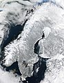 स्कैंडिनेविया प्रायद्वीप का शीतऋतु में अंतरिक्ष से लिया गया चित्र