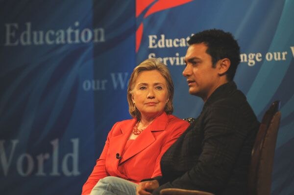 Khan with United States Secretary of State Hillary Clinton in 2009