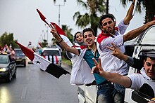 Damascus residents celebrating the re-election victory of President Bashar al-Assad (4 June 2014) Sryian people celebrate Bashar Assad's presidential re-election in Damascus-2014 (5).jpg