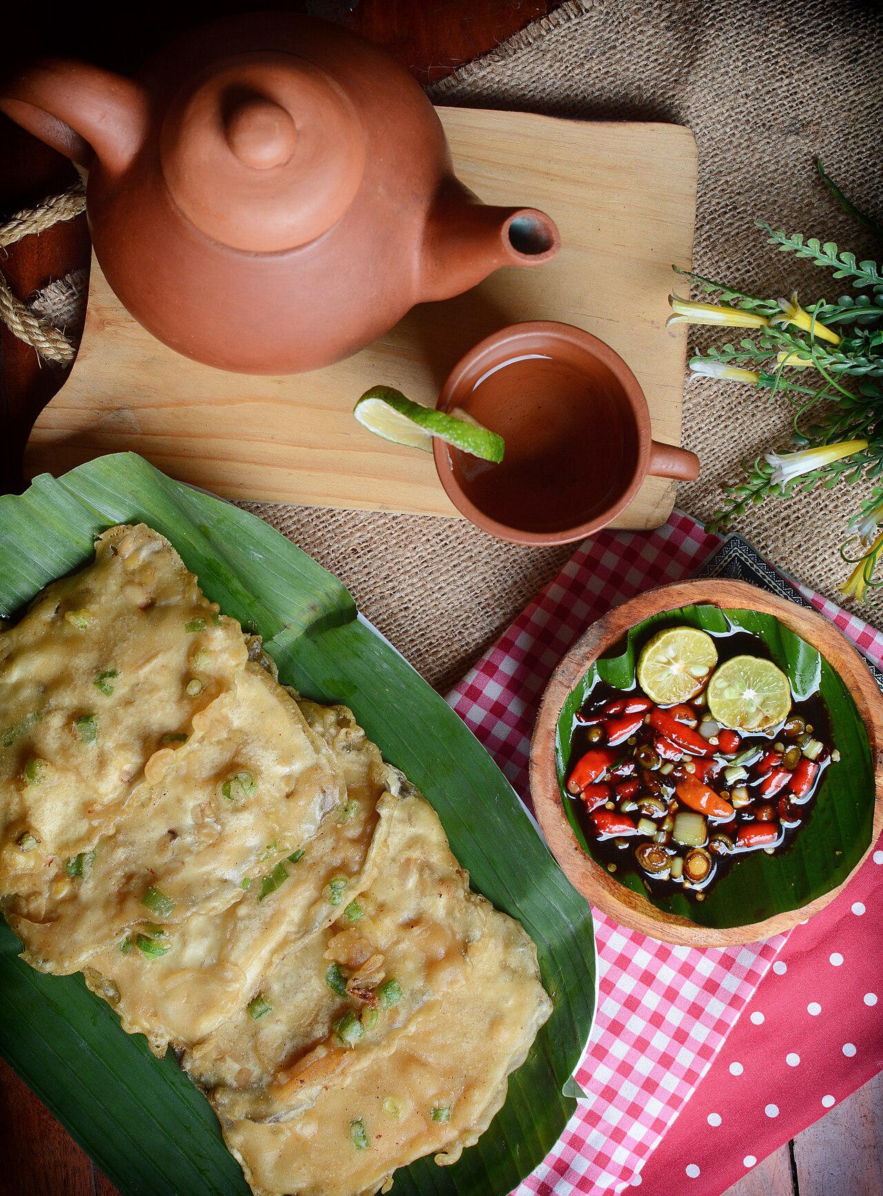 Tempe Mendoan is a traditional food from Central Java, mendo means half cooked.