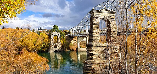 The Alexandra Bridge Towers in autumn, remnants of the old bridge next to the 1958 arch bridge.