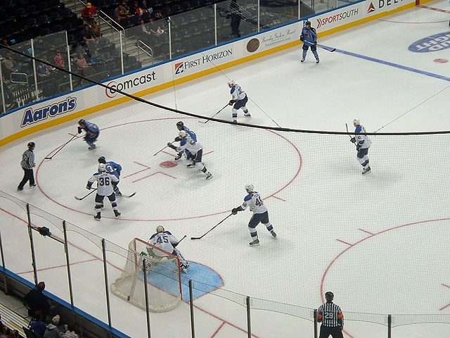 The Thrashers take the puck into the offensive zone against the St. Louis Blues at Philips Arena on September 22, 2007.