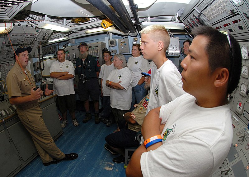 File:US Navy 070809-N-9758L-021 Auxiliary officer, Lt. j.g. Scott Martin, assigned to the guided-missile frigate USS Reuben James (FFG 57), explains the controls and operation of the central control station to Boy Scouts and Troop L.jpg